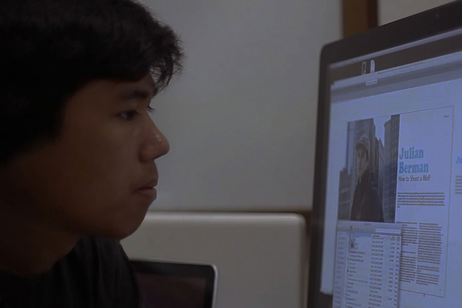 KCC New Media Arts - background photo of a Student Working on a Visual Design on a Computer Monitor